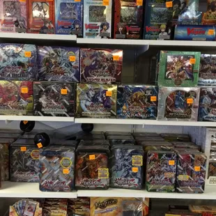 We carry many Yu-Gi-Oh packs and singles we also have Yu-Gi-Oh tournaments.