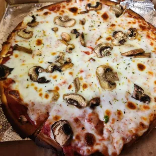 Cauliflower mushroom pizza