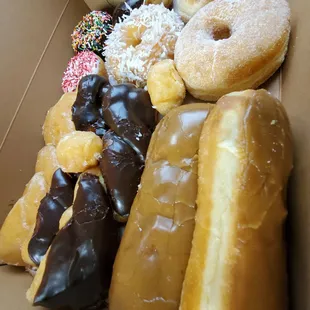 a variety of doughnuts in a box
