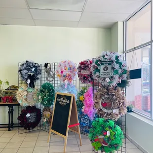 Wreaths for sale are made by a regular patron. The proceeds of the sales go toward funding her chemo treatments.