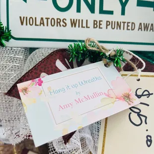 Wreaths for sale are made by a regular patron. The proceeds of the sales go toward funding her chemo treatments.