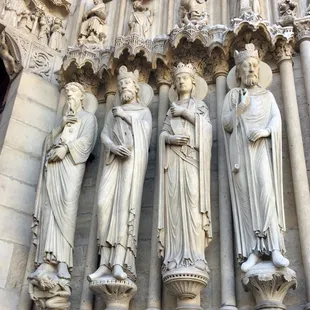 statues on the side of a building