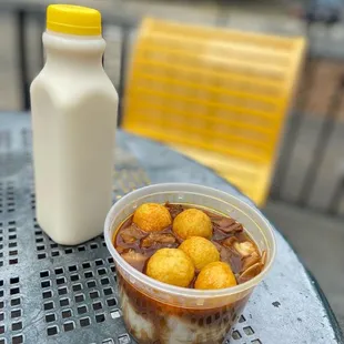 Soy milk &amp; beef brisket with curry fish ball over rice noodles