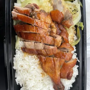 Roast duck over rice, $8. Expected more duck than this!
