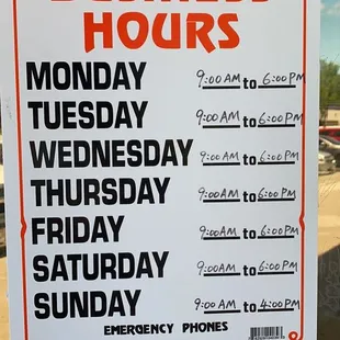 a business hours sign