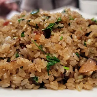 a plate of rice and vegetables