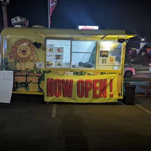 a food truck parked in a parking lot