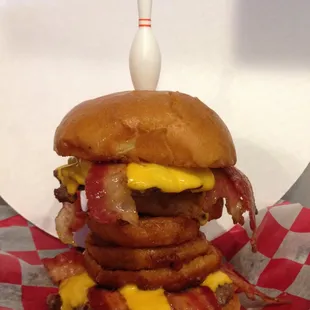 The new "Pinion" burger at Sun Ray Lanes. See if you can topple the Pinion or will you leave it standing.