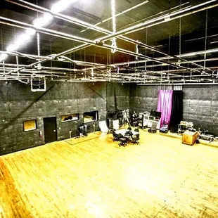 Full stage with lighting truss: Performance, rehearsal, and music video recording. Stage 1 is even wired to our Audio Suite for mixing.