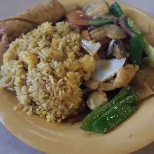 Fried rice, egg roll, shrimp, beef, veggies.