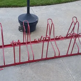 Minimal bike parking, but maybe they'd let you lock a bike to the metal fence...?