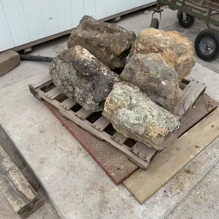 a pile of large rocks on a pallet
