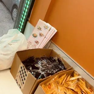 two boxes of food on a counter