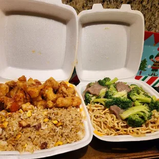 two take out containers of food