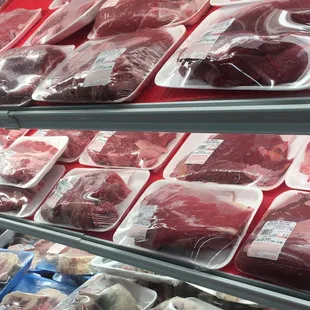a display of raw meat