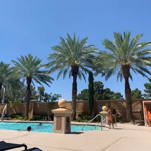 Pool area with daybeds