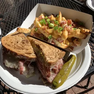 a sandwich and fries on a plate
