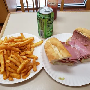 The $10 lunch special included a canned soda, plate of fries, and an 8" sub
