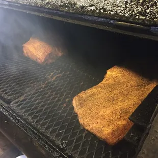 Pork shoulder and brisket going on the grill!