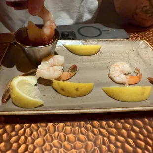 Jumbo shrimp cocktail (he ate a few before the pic) lol