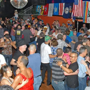 a large crowd of people dancing