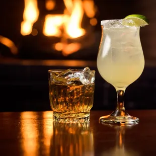 His and her cocktails.  Breuckelen Rye Whiskey on rock &amp; Our House Margarita.