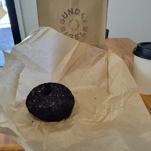 A black sesame harissa bagel, toasted with butter