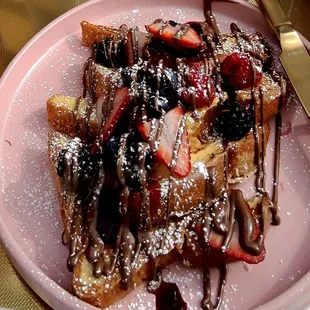 French toast with fresh fruits drizzled with nutella