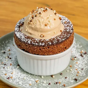 Our famous Sunday Sundae Souffle served with salted caramel gelato on top