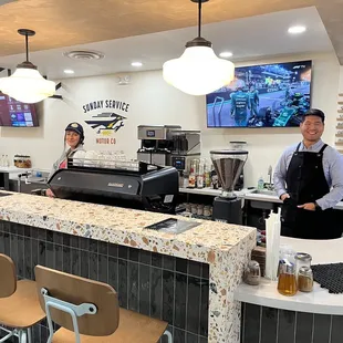 Coffee bar, server and owner