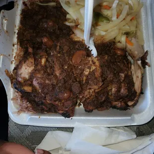 Large Jerk chicken, rice n peas, cabbage, oxtail gravy on top