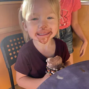 My daughter - absorbing her Sundaze FroYo through her chin apparently