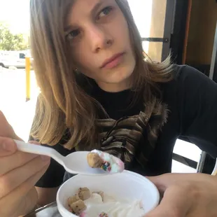 Kid eating frozen confection.