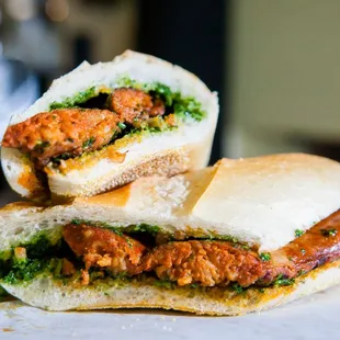 a chicken sandwich cut in half