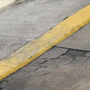 Speed bump from hell. You can see it's been hit by many cars.