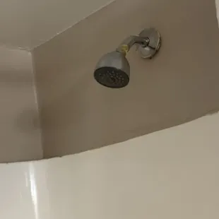 Unsecured and dirty showerhead