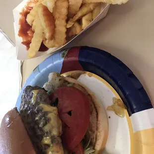 Cheeseburger with all the fixings and grilled onions  Fresh fries