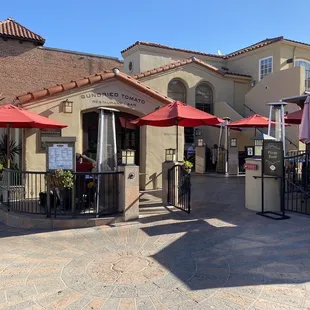 Outdoor seating left &amp; right of entrance (middle).