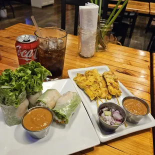 9/12/2024 - We were super hungry after catching a show at the Funhouse Lounge right down the street. chicken satay and shrimp salad rolls