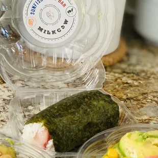 a sushi roll and a salad