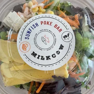a salad in a plastic container
