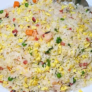 a plate of rice and vegetables
