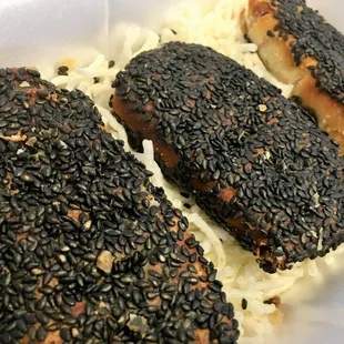 a close up of a meal in a styrofoam container