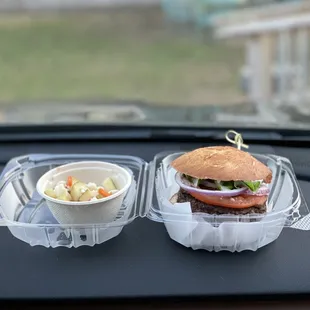 a hamburger and a side of coleslaw