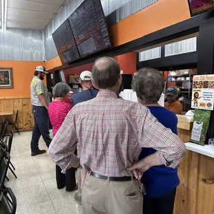 This is the plate lunch line. Menu items ordered from your table.