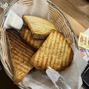 a basket of grilled sandwiches