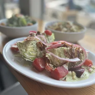 Our expanded menu of lunch and dinner salads includes this wedge salad.