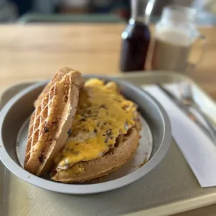 a waffle sandwich on a plate