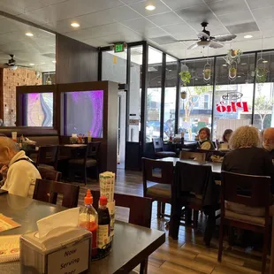 diners sitting at tables in a restaurant