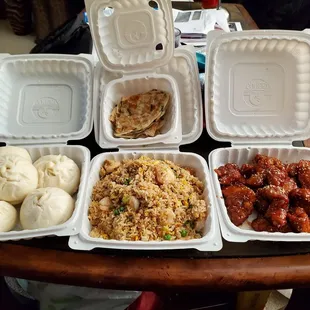 Top: Green onion pancake L to R: BBQ pork bun, shrimp fried rice, sesame chicken